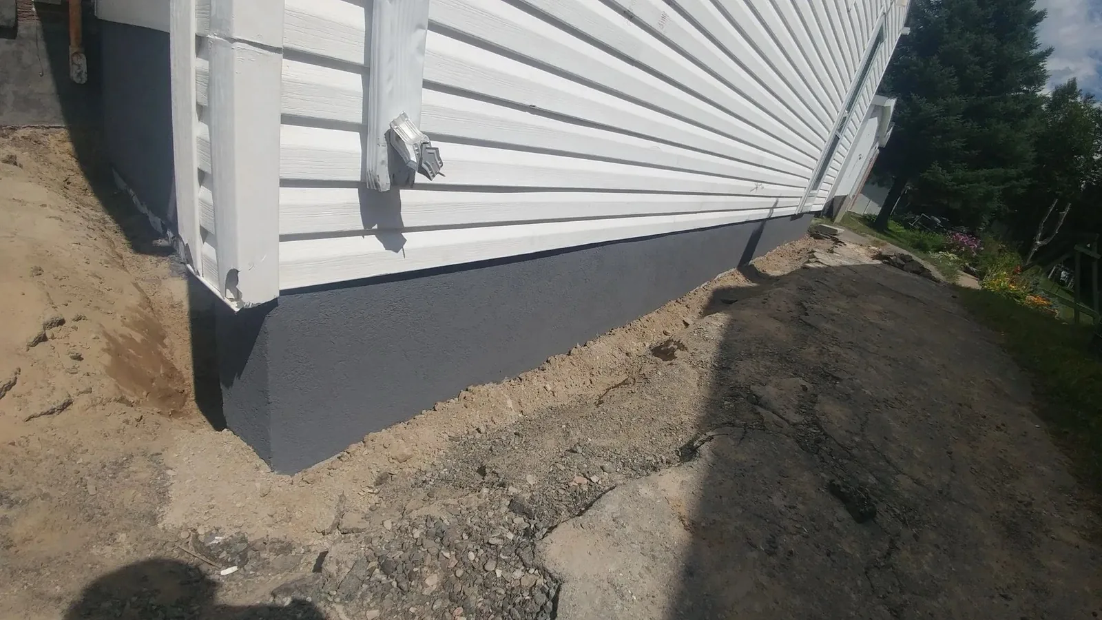Acrylic parge coating on foundation