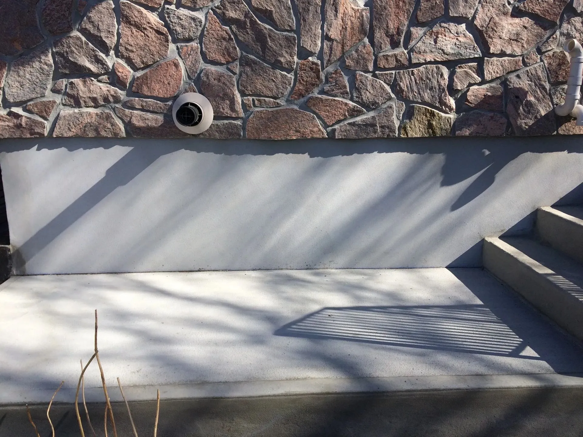 Parged Foundation with Stone Veneer — Foundation Masters project